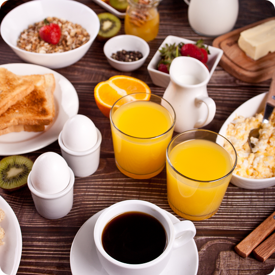 cup-coffee-juice-eggs-fruits-toasts 2